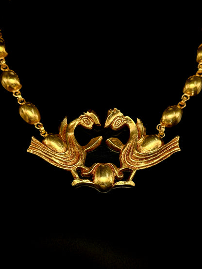 Collier "La poule aux œufs d'or"